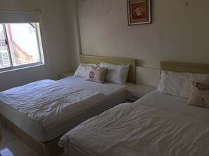 Basic Quadruple Room | Blackout drapes, free WiFi