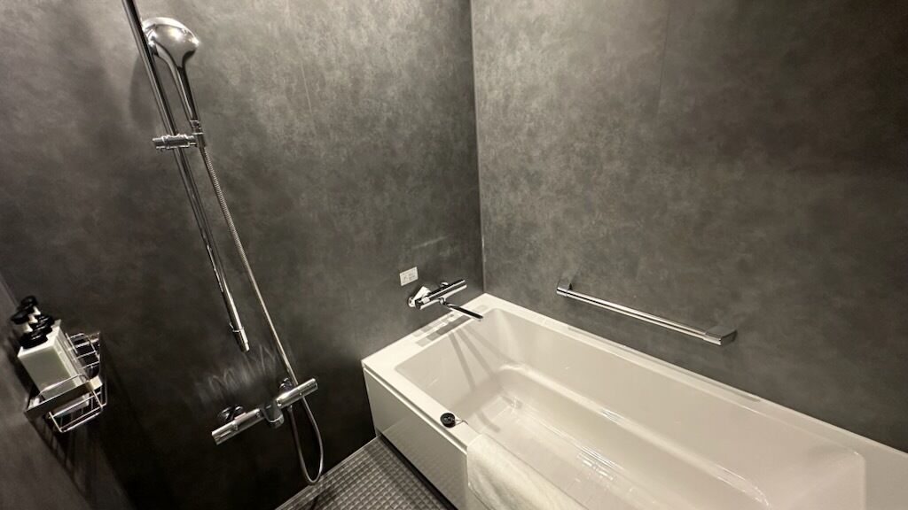 deluxe quadruple room (4 single beds), non smoking | bathroom | shower, free toiletries, hair dryer, slippers