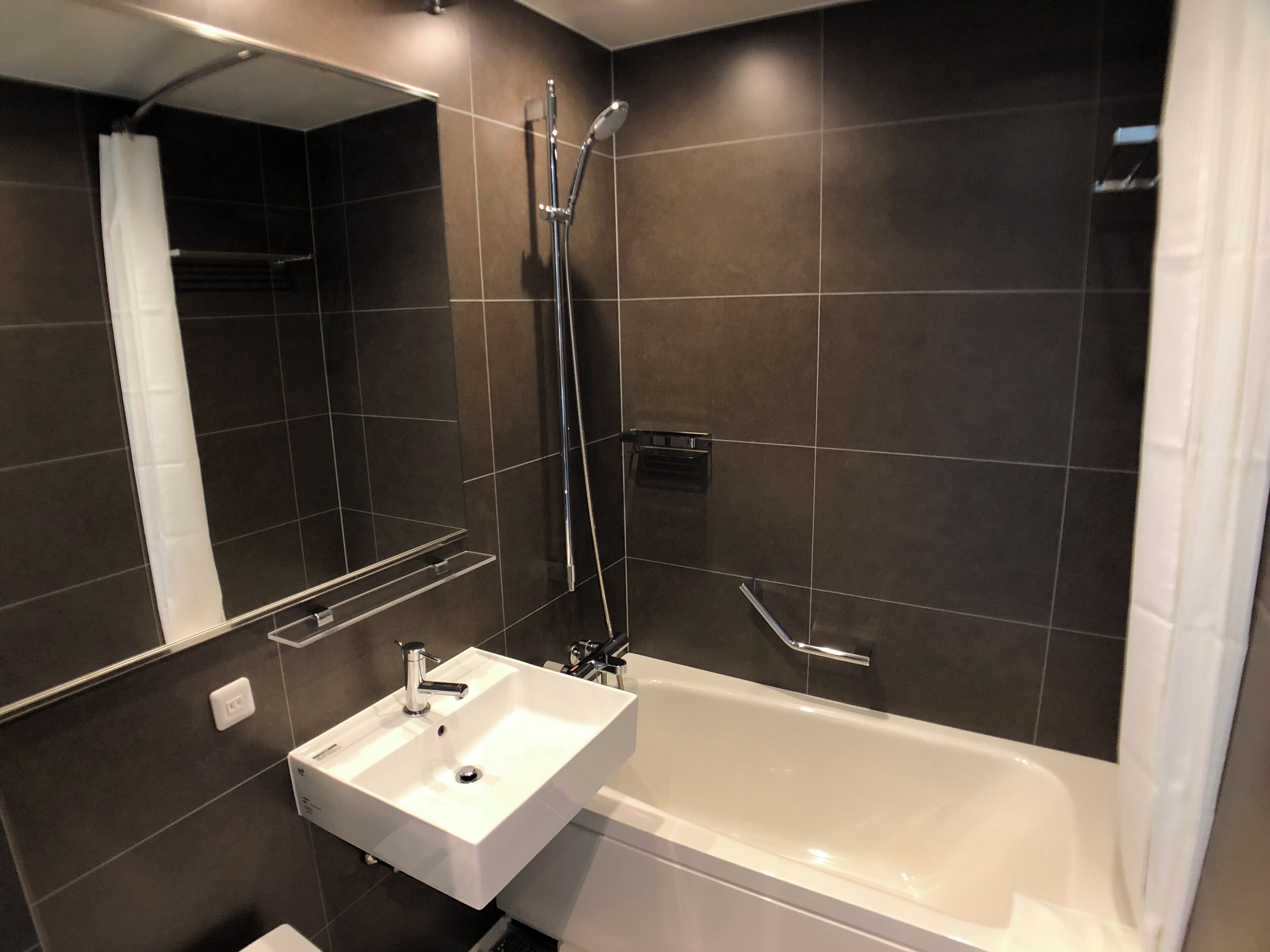 shower, free toiletries, hair dryer, slippers