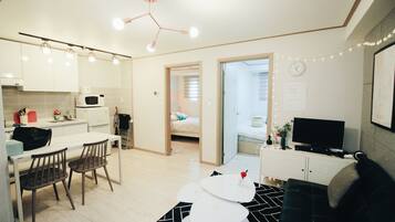 Family Apartment (D) | Living area | Flat-screen TV