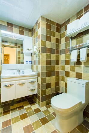 Suite, 1 Bedroom | Bathroom | Shower, free toiletries, hair dryer, slippers