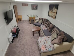 Smart TV, fireplace, video games, foosball