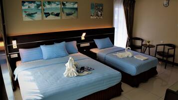 Deluxe Family | In-room safe, desk, blackout drapes, iron/ironing board