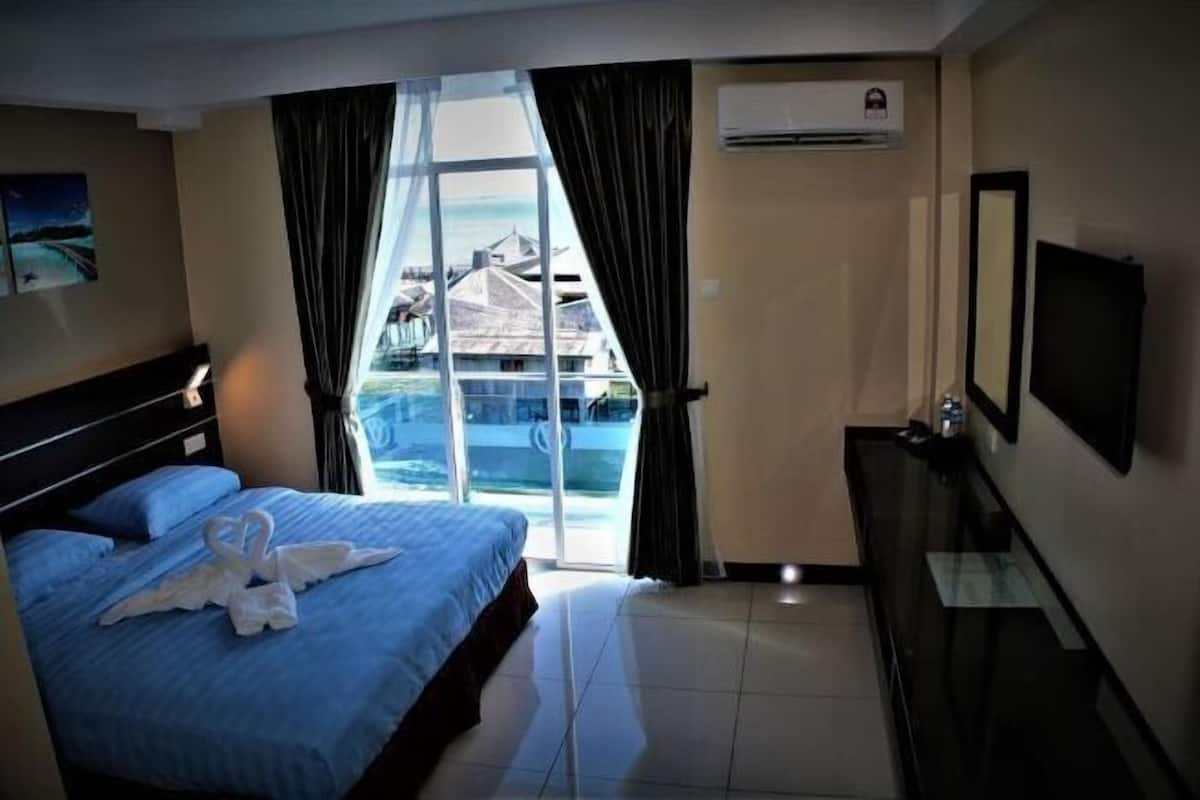 In-room safe, desk, blackout curtains, iron/ironing board