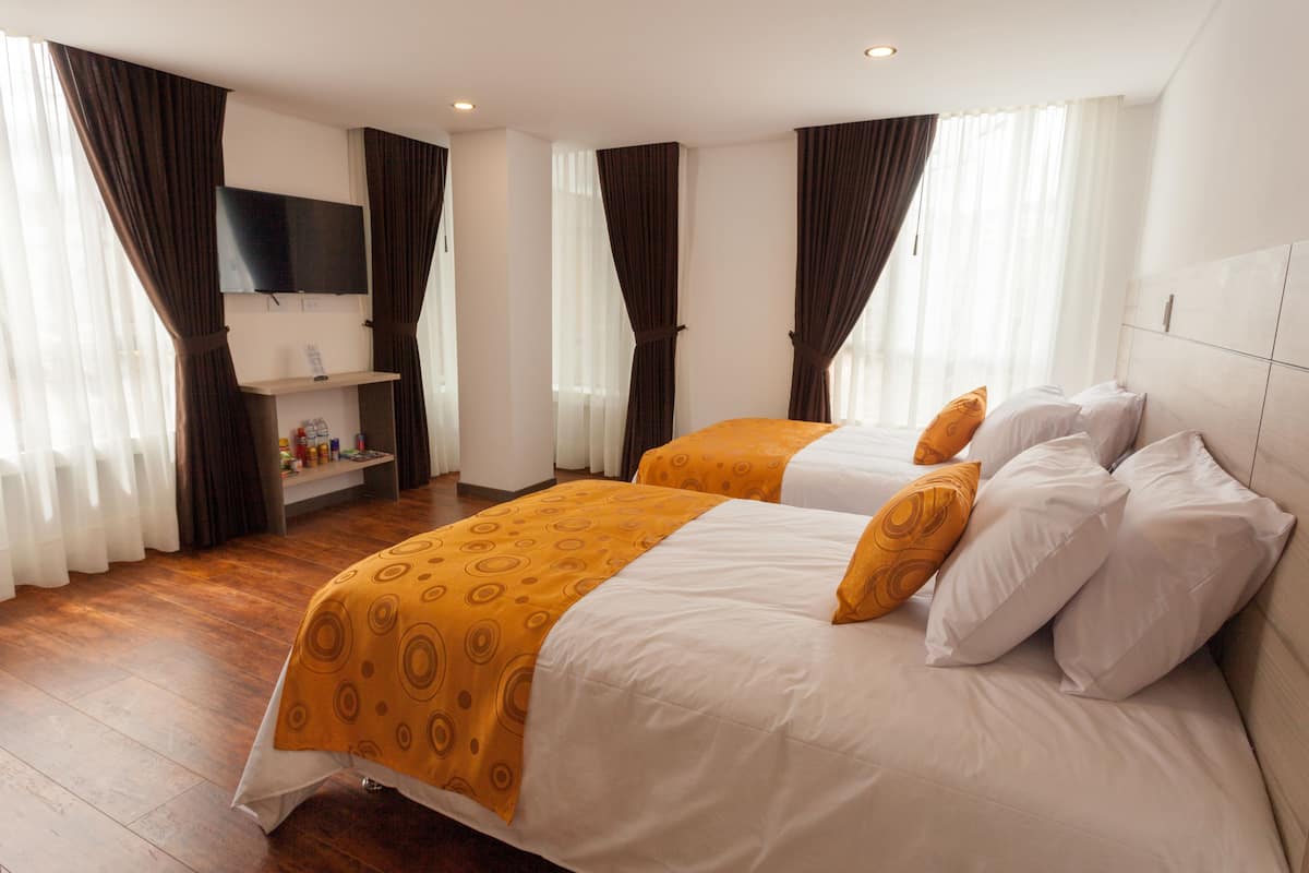 superior twin room | minibar, in-room safe, desk, iron/ironing board