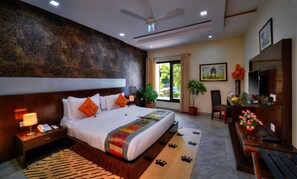 Quarto premium, 1 cama King, vista para o jardim | Vista do quarto