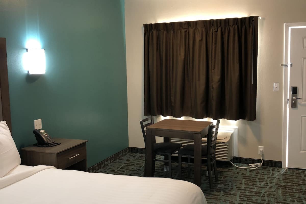 comfort suite, 1 king bed | premium bedding, desk, free wifi