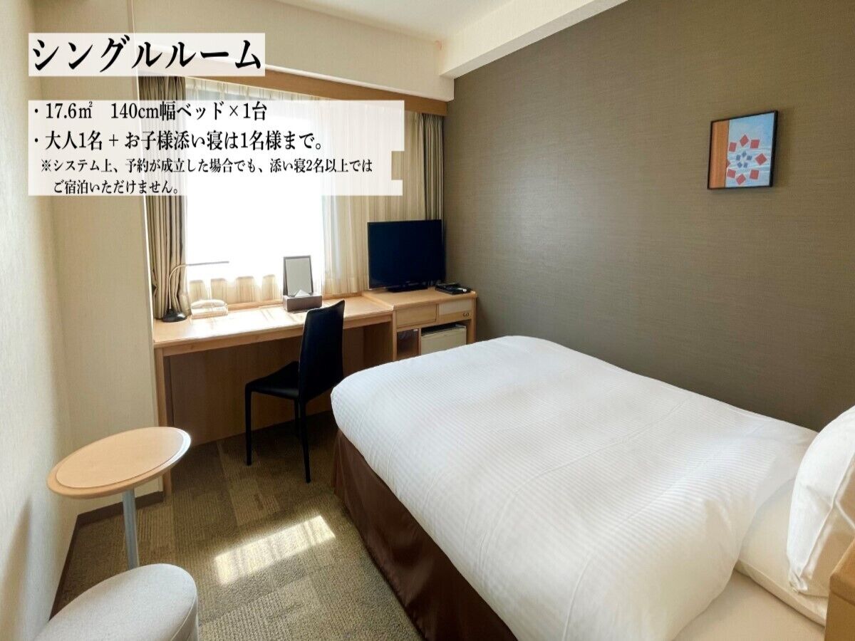 Desk, blackout drapes, iron/ironing board, rollaway beds