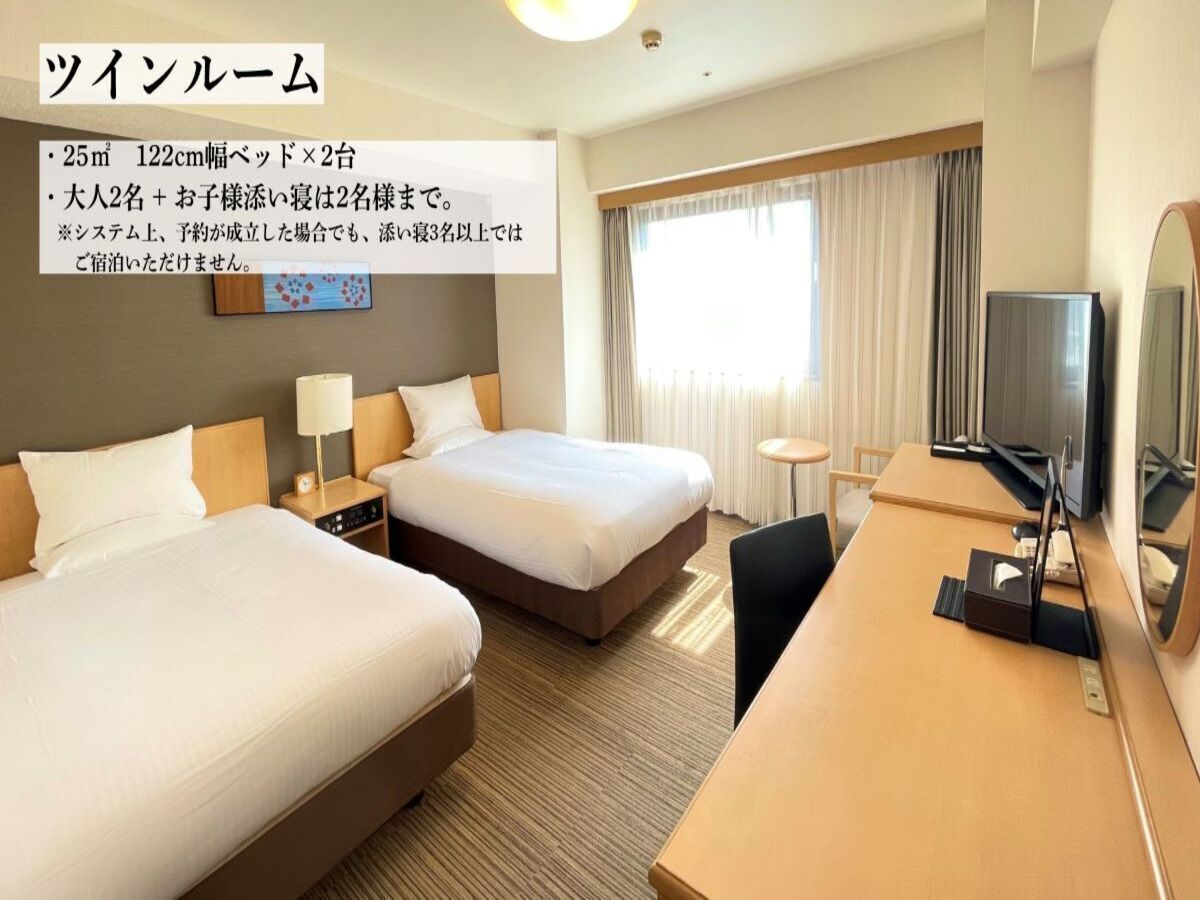 Desk, blackout drapes, iron/ironing board, rollaway beds