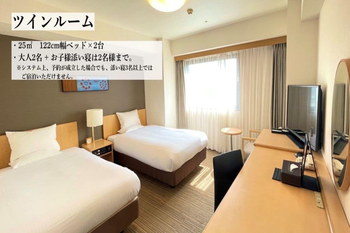 Desk, blackout drapes, iron/ironing board, rollaway beds