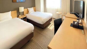 Desk, blackout drapes, iron/ironing board, free cribs/infant beds