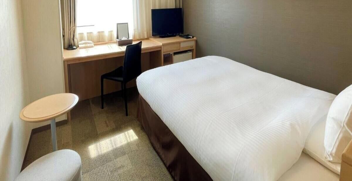 Desk, blackout drapes, iron/ironing board, rollaway beds