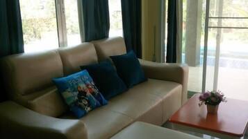 4-Bedroom Villa with Private Pool | Living room | Flat-screen TV