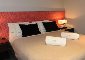 2 bedrooms, premium bedding, iron/ironing board, free wired Internet