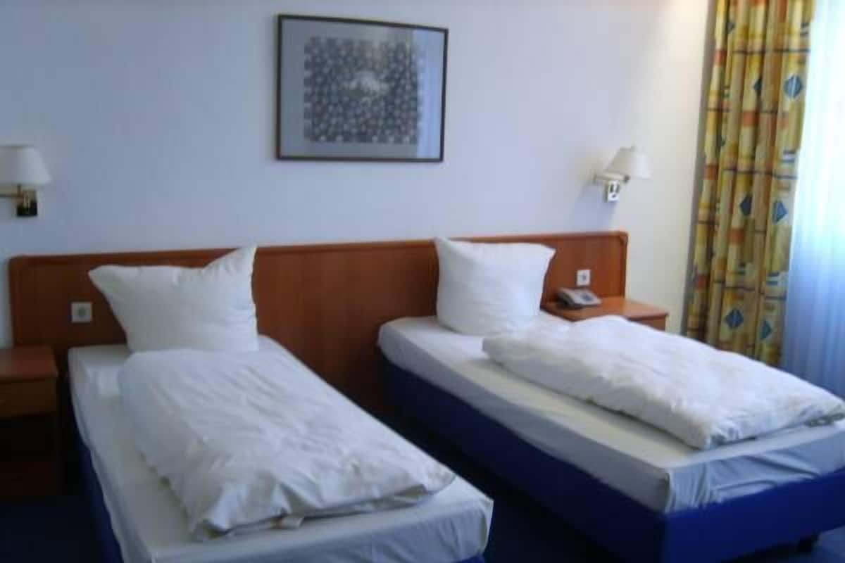 Double or Twin Room, River View | Desk, free WiFi, bed sheets