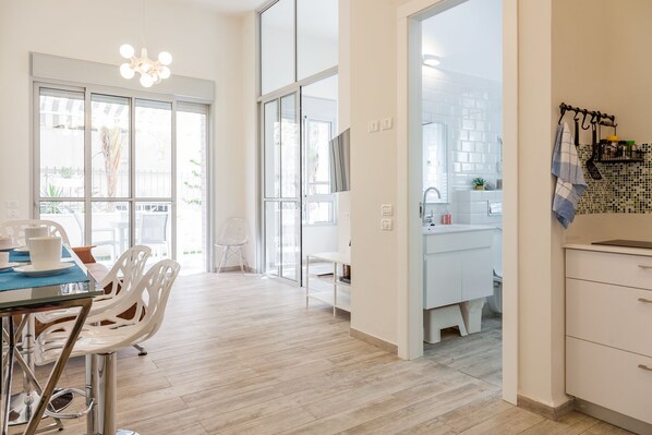 Executive Apartment, 2 Bedrooms, Terrace | Living area | Flat-screen TV, fireplace - Apt Terrace & Garden - Bauhaus (Tel Aviv)