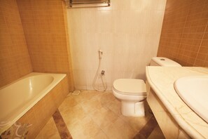 Deluxe Twin Room | Bathroom | Shower, free toiletries, slippers, towels - White Orchid (Cox's Bazar)