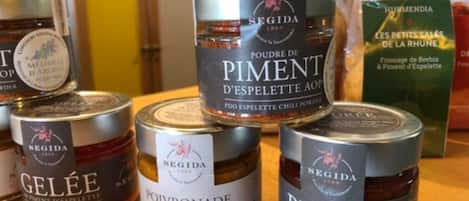 Various jars of Segida brand spices and condiments, including Piment d'espelette and Gelée.