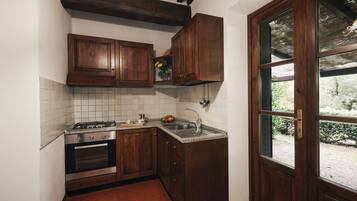 Apartment, 2 Bedrooms (Il Pino) | Private kitchen | Fridge, oven, stovetop, electric kettle