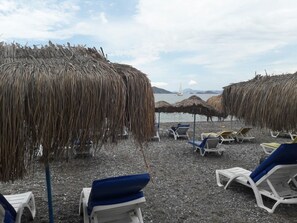 Private beach nearby, white sand, sun-loungers, beach umbrellas