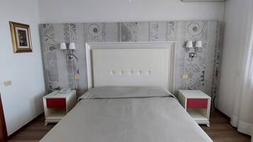 Superior Double Room | Minibar, in-room safe, desk, iron/ironing board