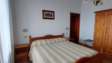 Standard Double or Twin Room | Minibar, in-room safe, desk, iron/ironing board