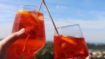 Seasonal outdoor pool, open 10:00 AM to 9:00 PM, pool umbrellas