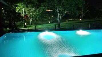 Outdoor pool, open 6 AM to 10:00 PM, pool loungers