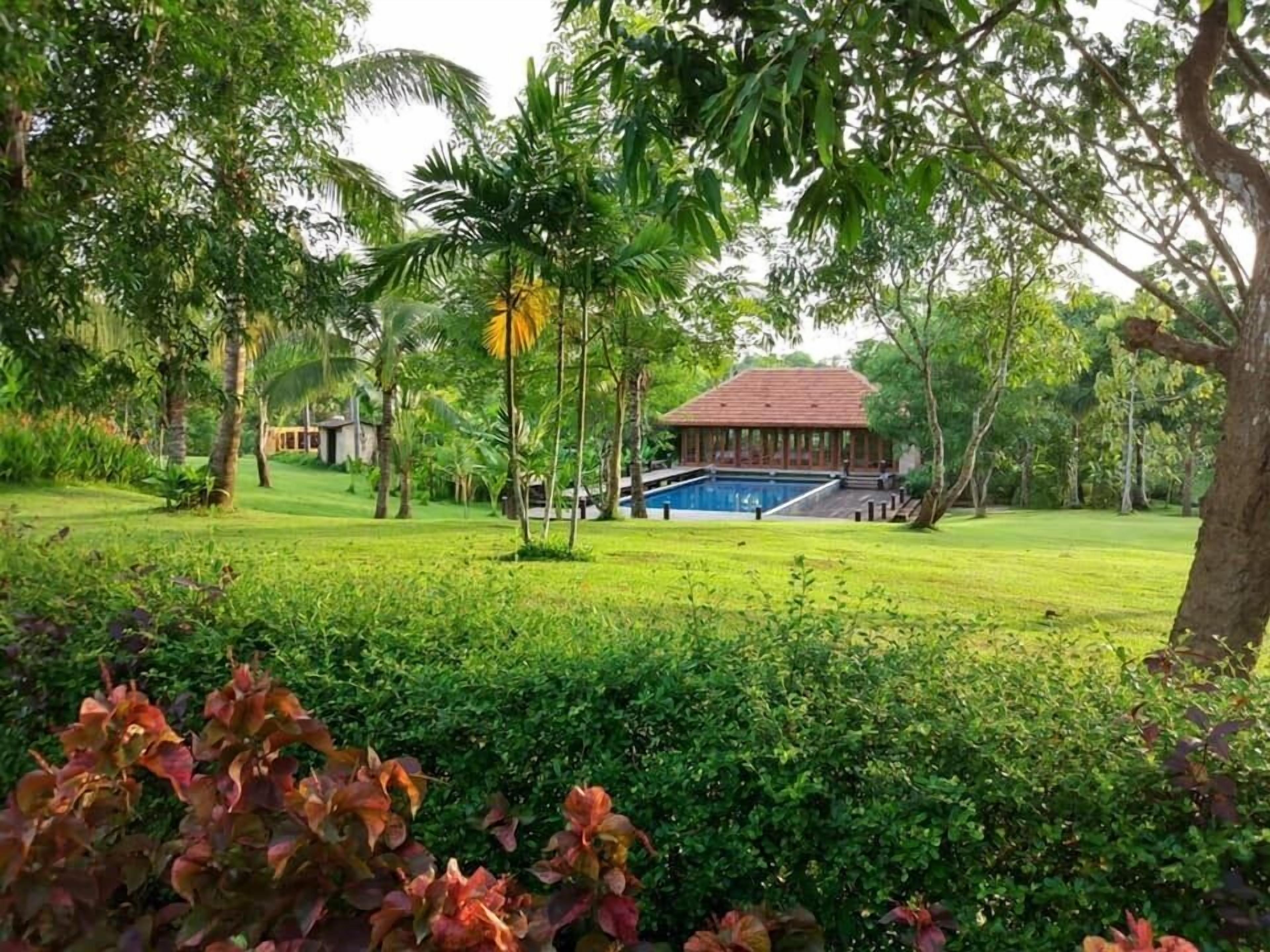 Outdoor pool, open 6 AM to 10:00 PM, sun loungers