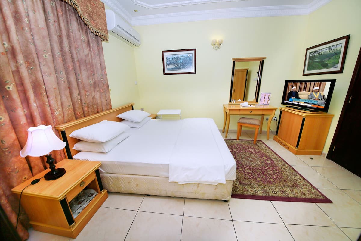 Suite, 1 Bedroom | Iron/ironing board (on request), WiFi (free)