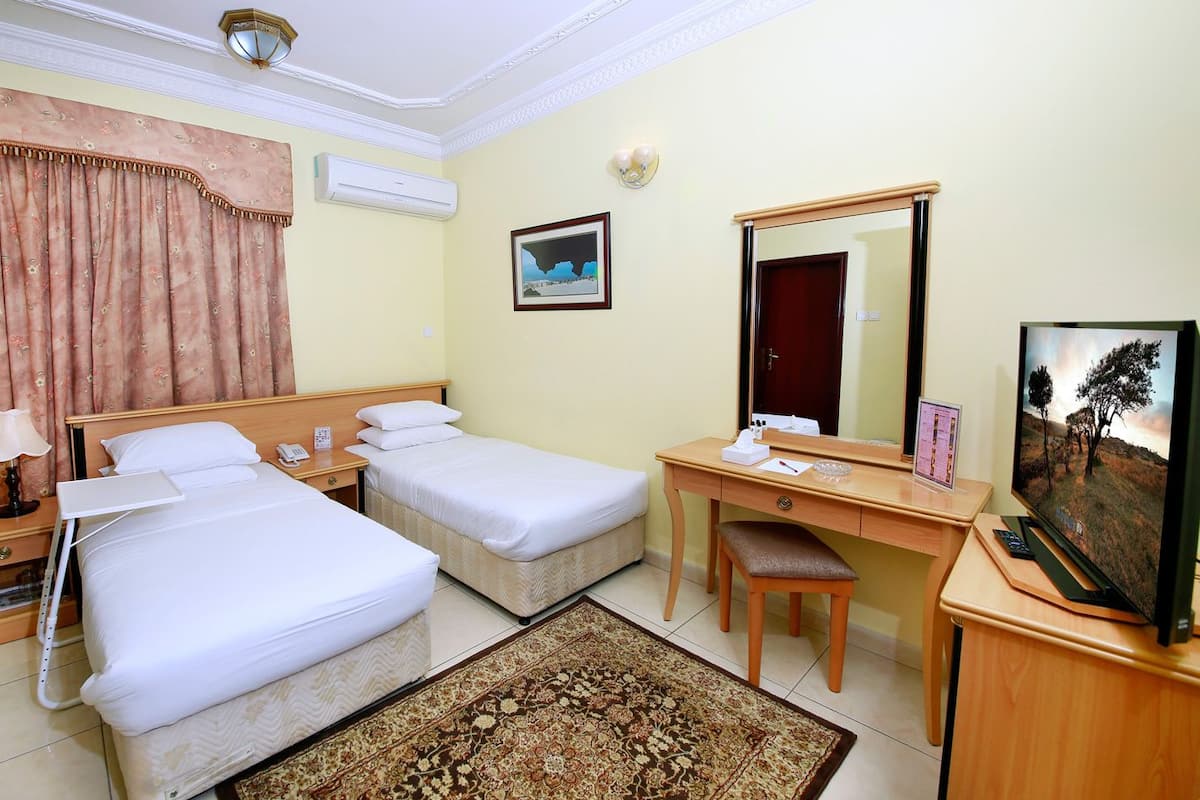 Twin Room | Iron/ironing board (on request), WiFi (free)