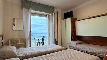 Standard Triple Room | In-room safe, desk, blackout drapes, soundproofing