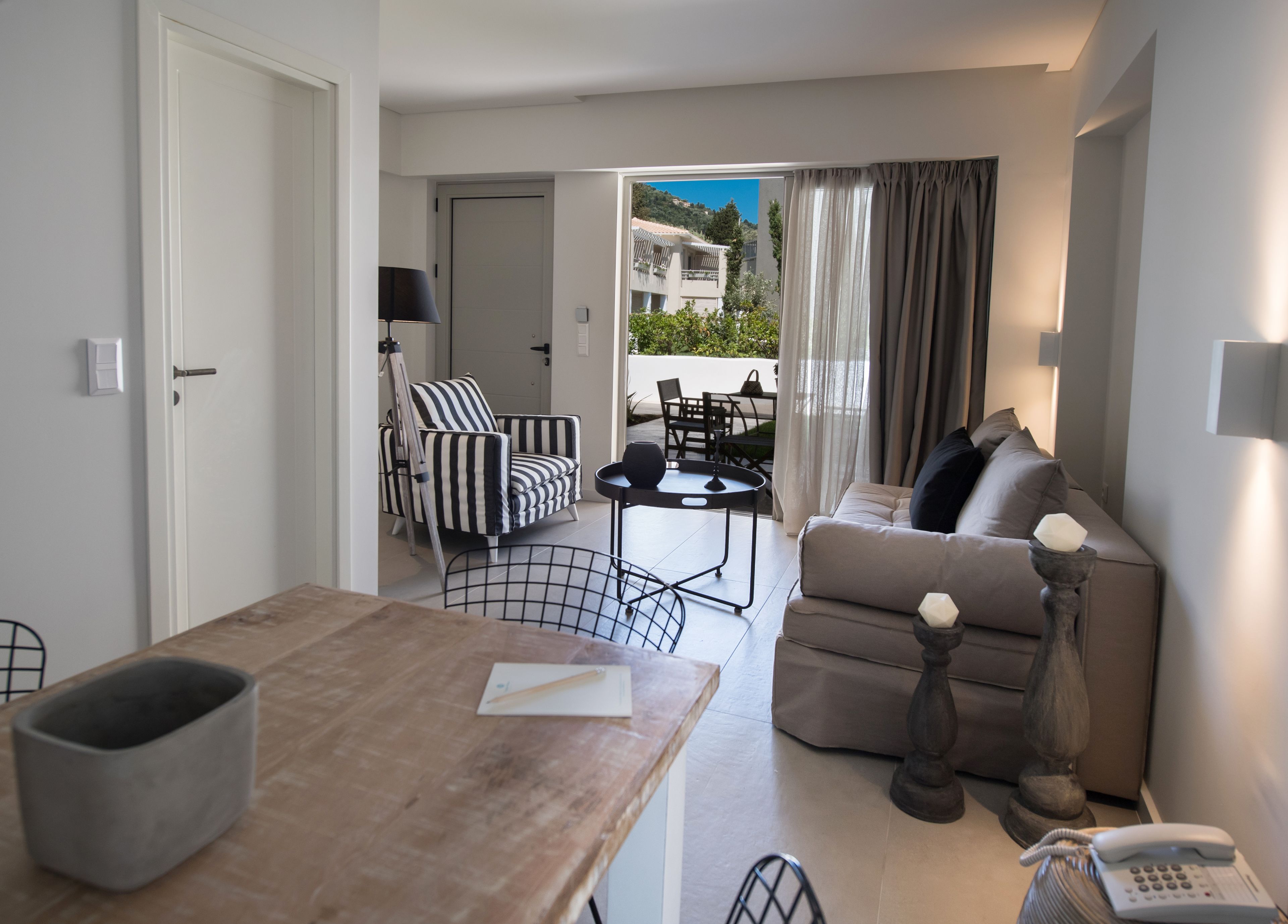 suite, garden view | living room | 32-inch smart tv with digital channels, tv