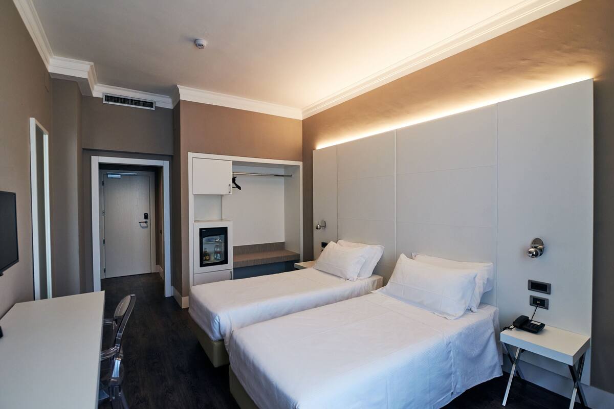 desk, cots/infant beds, free wifi, bed sheets