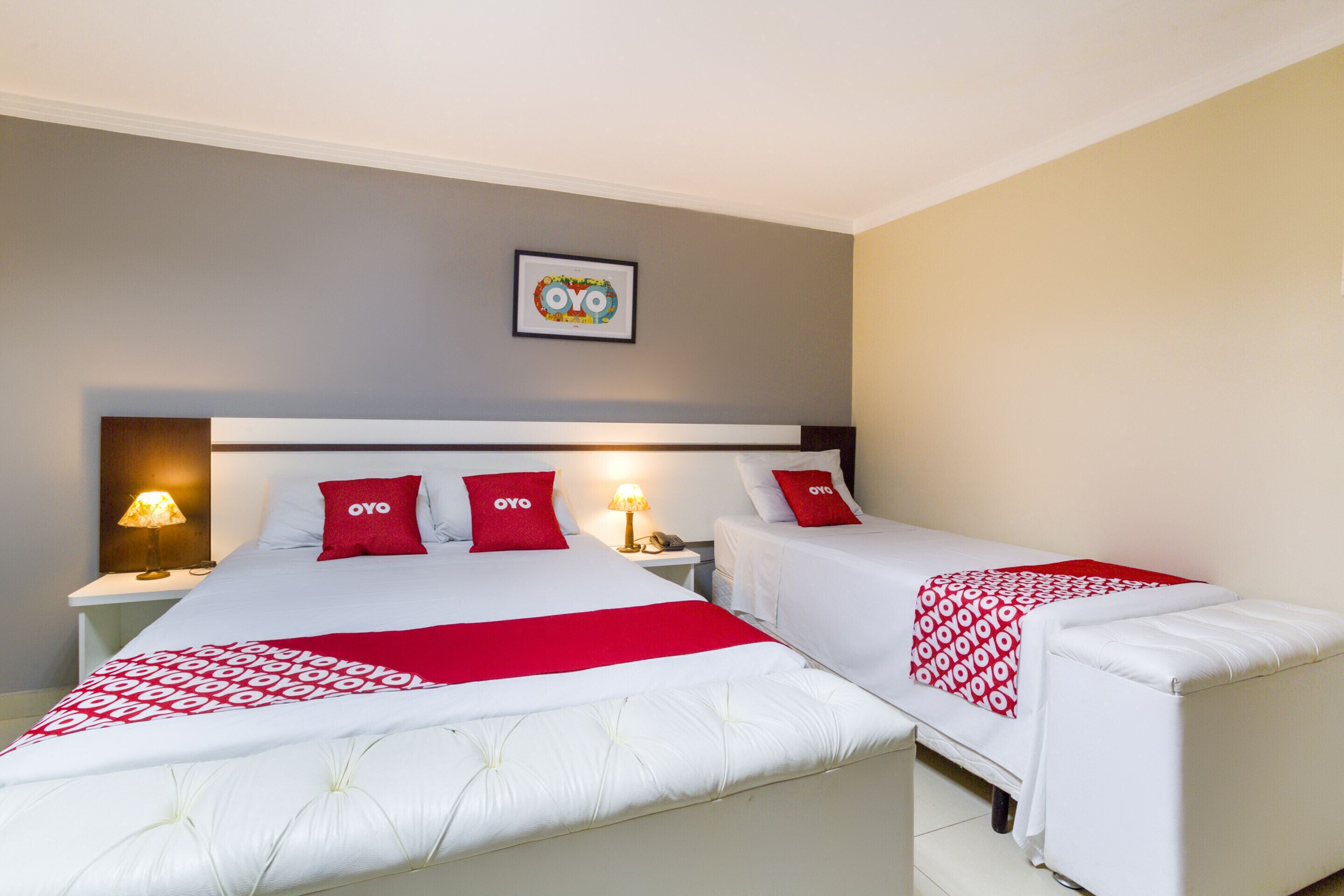 triple room, multiple beds | minibar, in-room safe, desk, blackout curtains