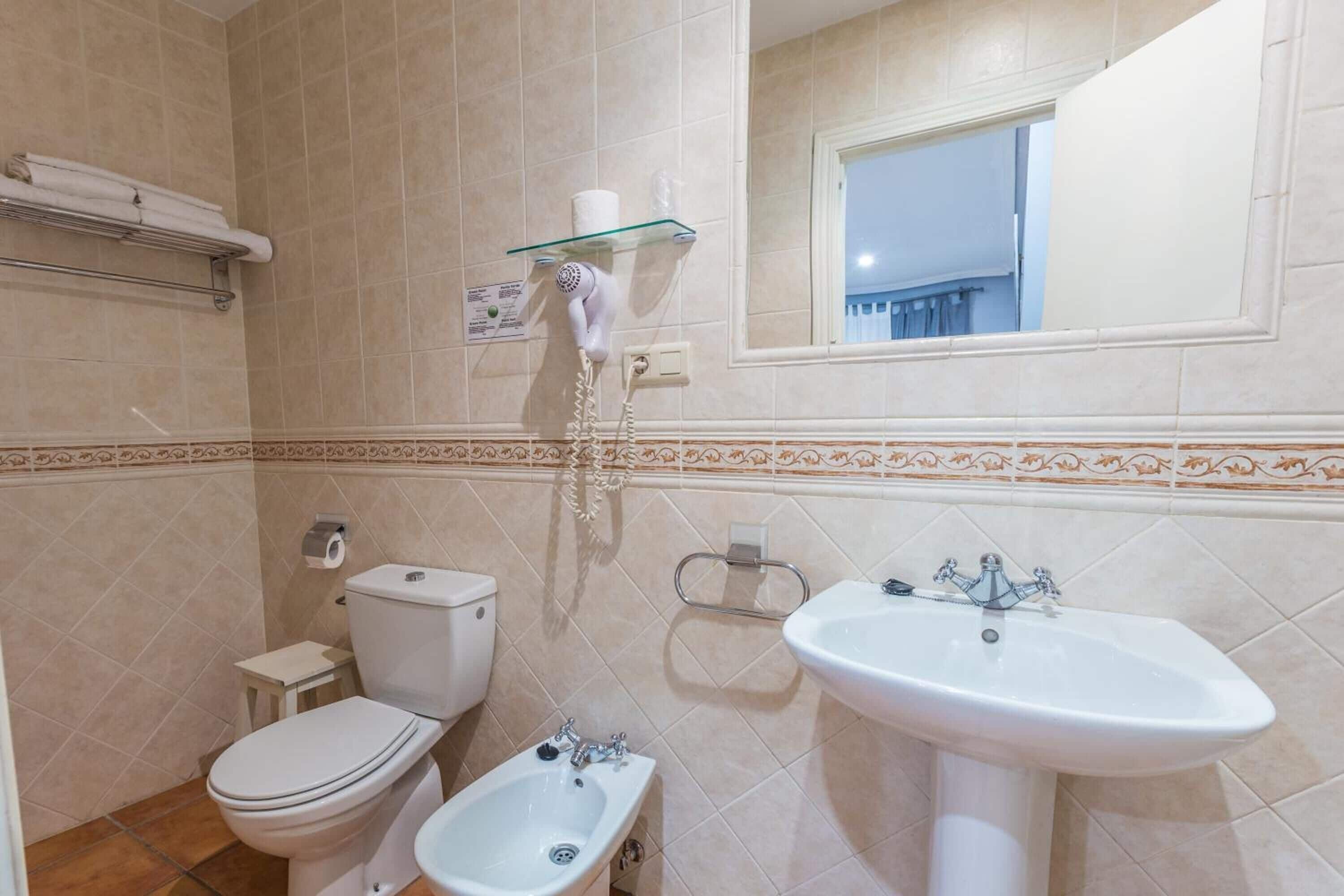 free toiletries, hair dryer, towels