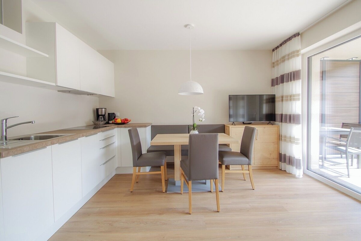 Grand Apartment, 2 Bedrooms, Accessible, 2 Bathrooms | Living area | 45-inch plasma TV with cable channels, TV, heated floors