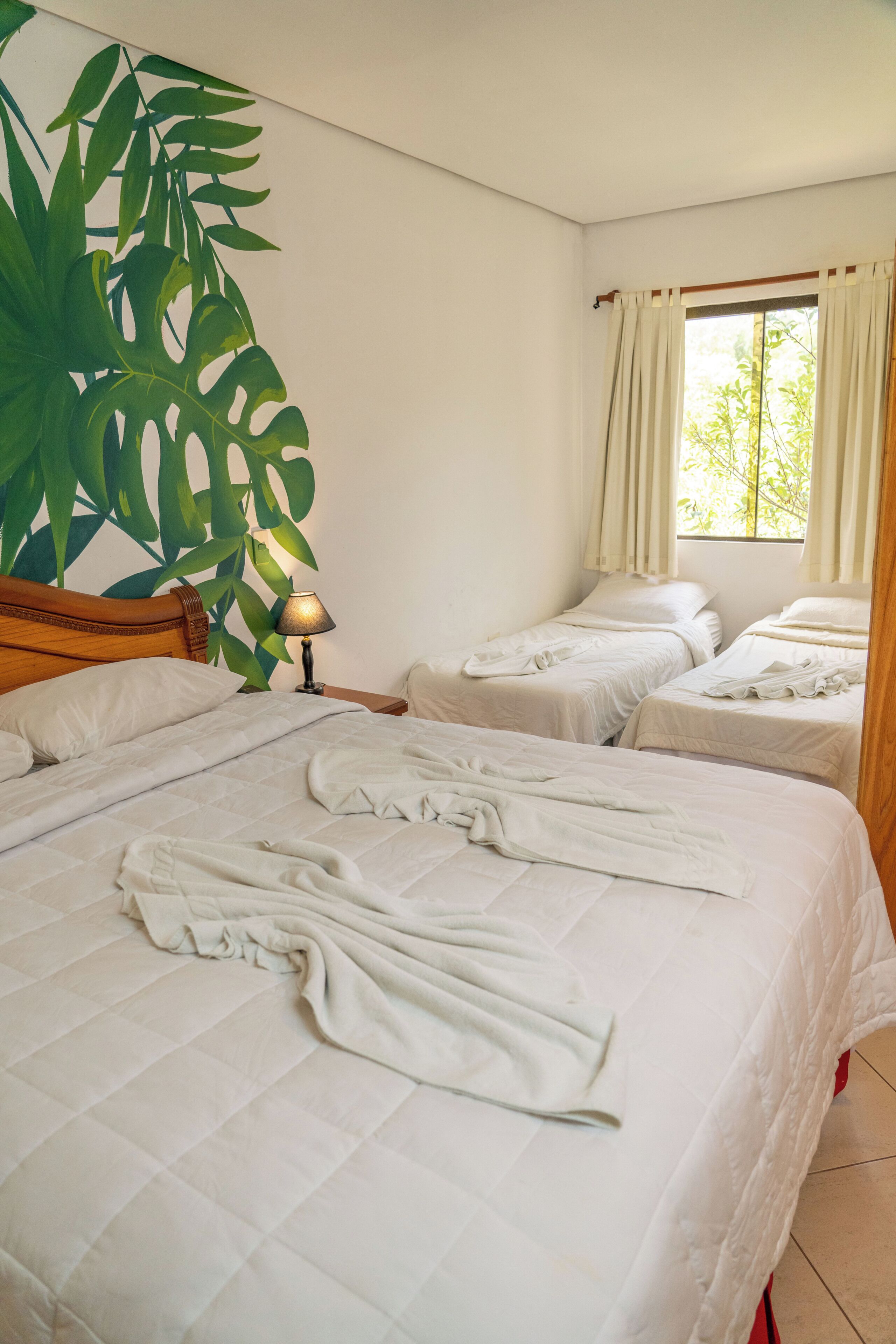 Family Quadruple Room | Minibar, in-room safe, desk, soundproofing