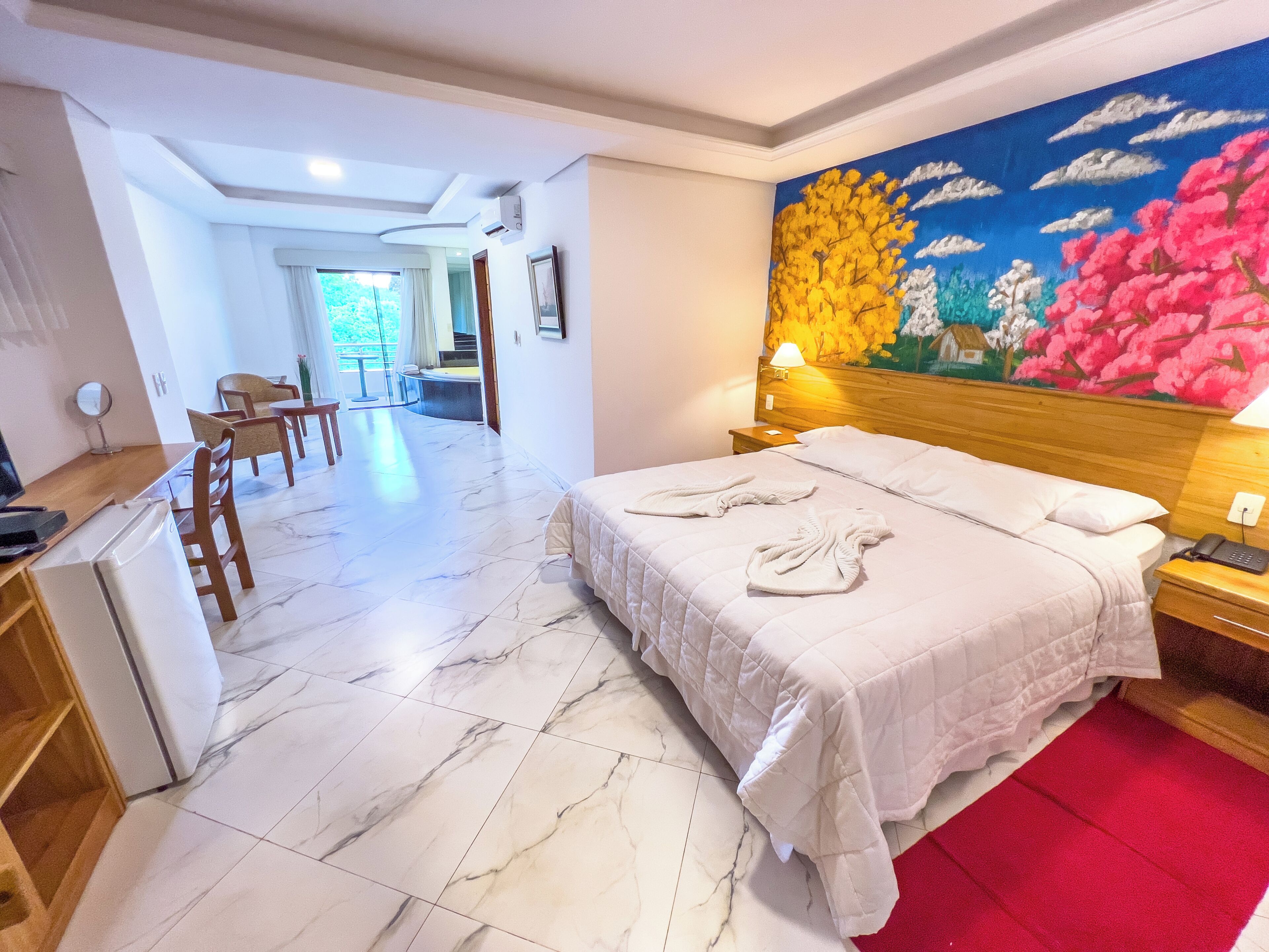 Deluxe Suite, Lake View | Minibar, in-room safe, desk, soundproofing