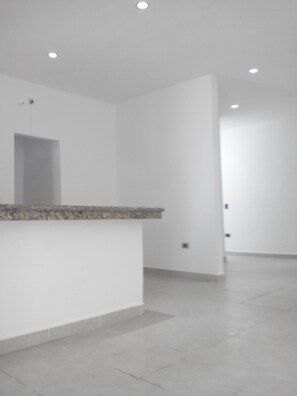 Casa económica | Área de sala de estar | Televisión 