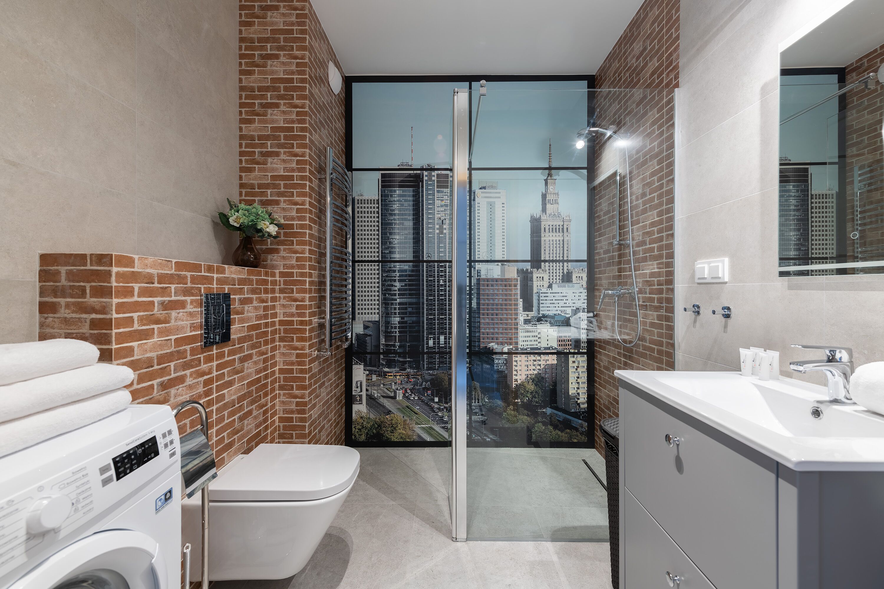 Business Apartment (C11) | Bathroom | Shower, free toiletries, hair dryer, towels