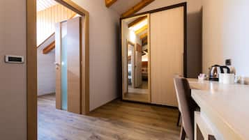 Family Quadruple Room | Bathroom | Shower, free toiletries, hair dryer, bathrobes