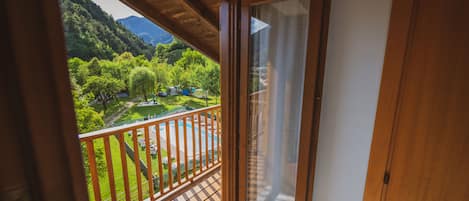 Junior Suite, Balcony | Down comforters, minibar, in-room safe, desk