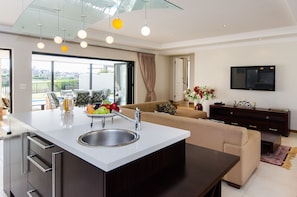 Fairway 15 Villa | Living area | Flat-screen TV, DVD player - Fairway 15 Villa (Cape Town)