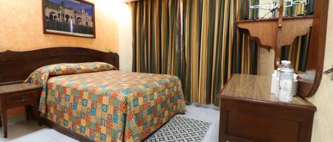 Desk, free WiFi, bed sheets