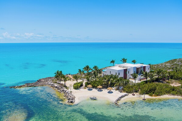 On the beach, sun loungers, beach towels