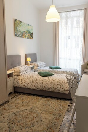 2 bedrooms, desk, iron/ironing board, travel crib
