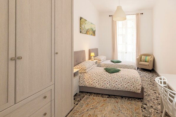 2 bedrooms, desk, iron/ironing board, travel crib