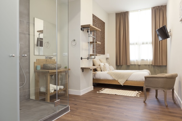 Premium bedding, down duvets, individually decorated