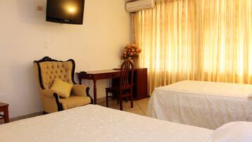 Twin Room, 2 Double Beds | Minibar, in-room safe, individually decorated, individually furnished